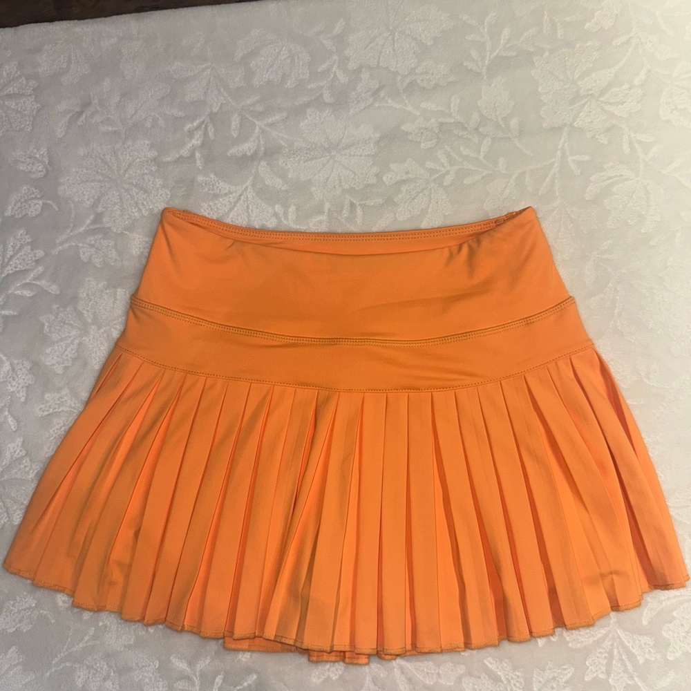 Gold Hinge 
Vibrant Orange Pleated Skort